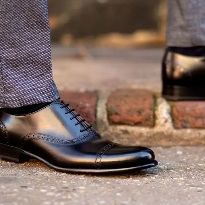Dress shoe logo