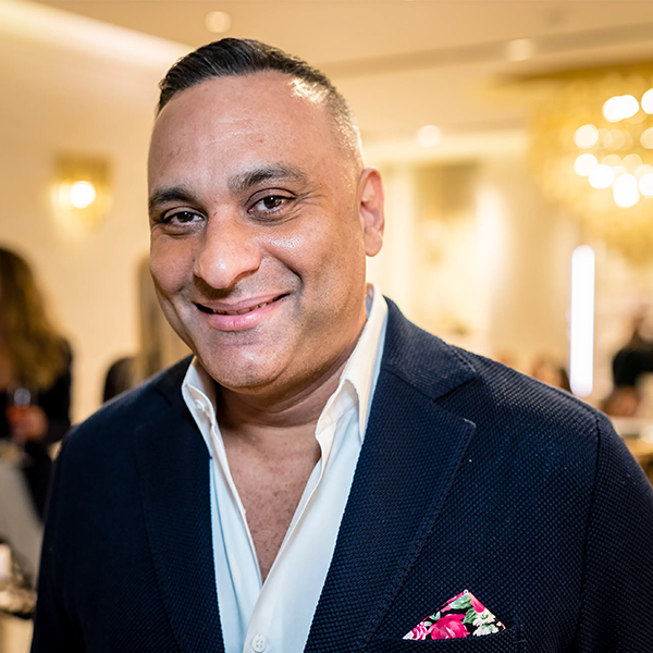Russell Peters logo