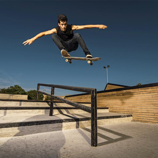 Skateboarding trick logo