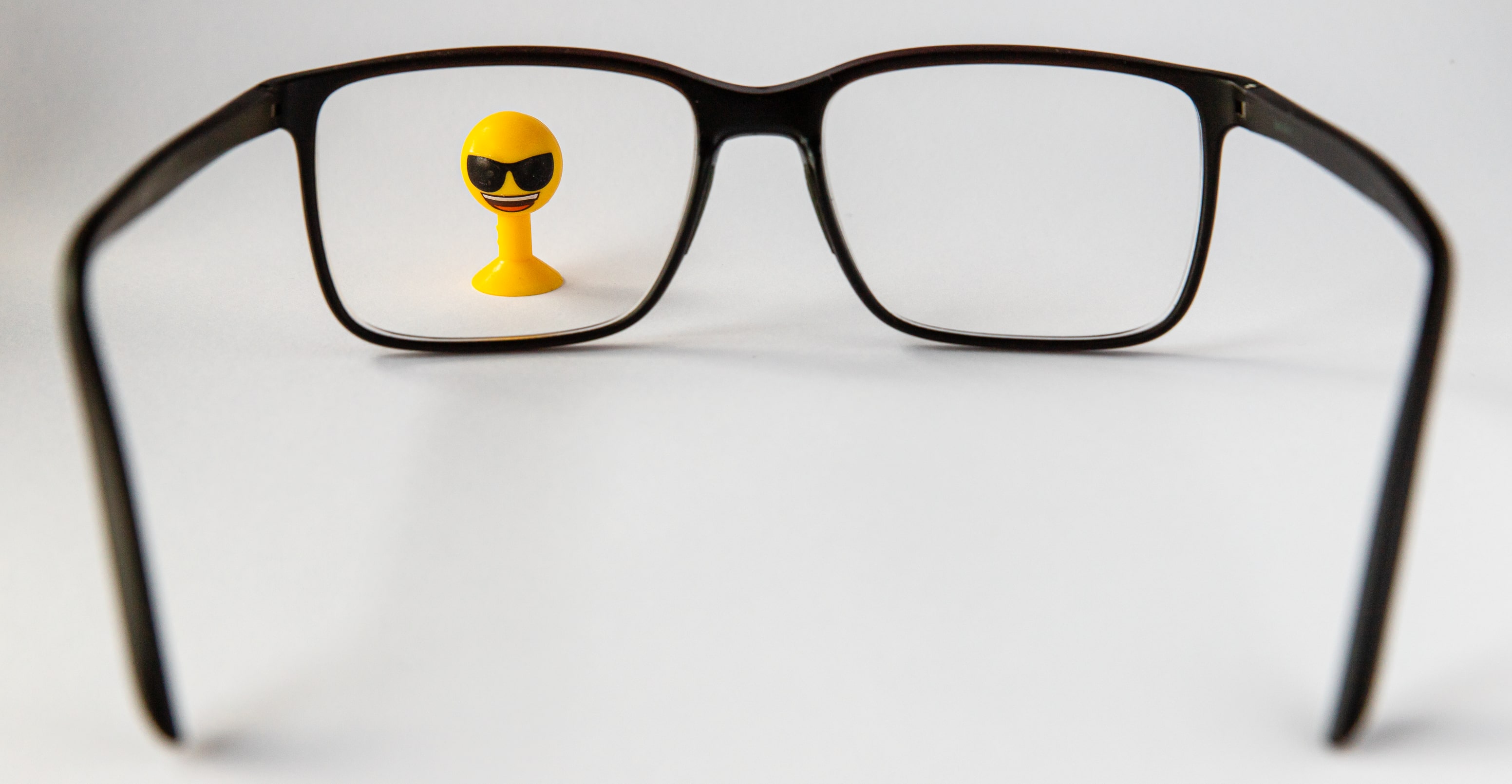 Corrective lens logo