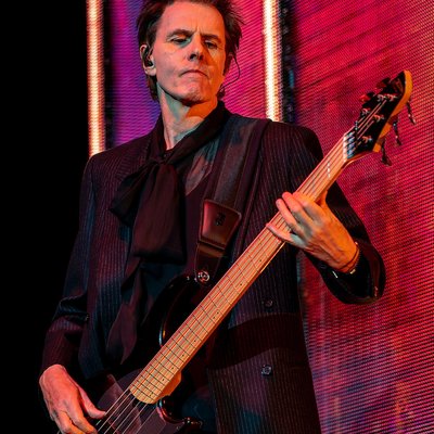 John Taylor (bass guitarist) logo