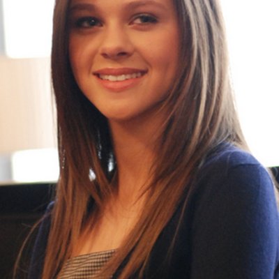 Nicola Peltz logo
