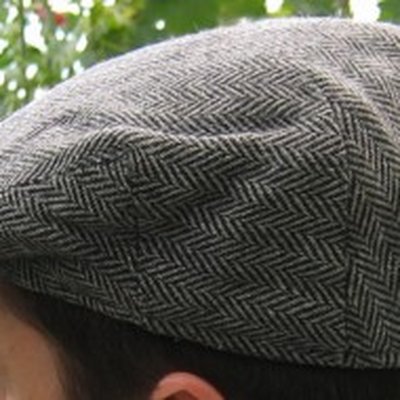 Flat cap logo