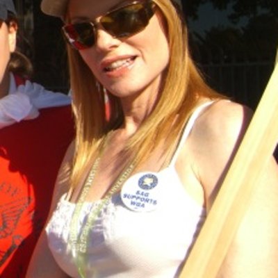 Marg Helgenberger logo